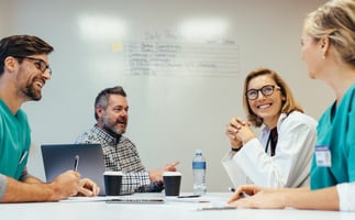 Pharmaceutical (pharma) professionals discussing HCP engagement strategies.